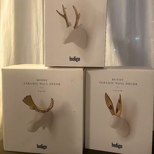 Set of 3 ceramic gold & white animal wall decor.